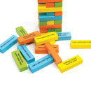 Obey The Block by Outset Media features colorful solid wood blocks with playful prompts like "TAKE ANOTHER TURN," creating a fun and unpredictable block stacking game as you build and balance the teetering tower.