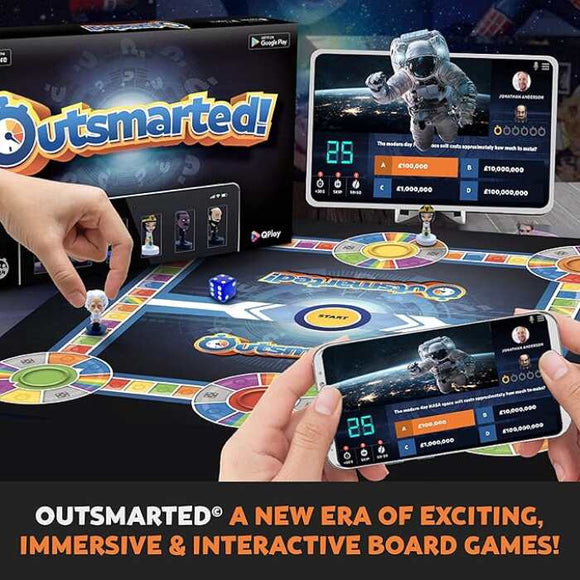 A vivid display of the "Outsmarted!" board game by Q Play features a dynamic digital component on both phone and tablet screens. The tablets showcase an astronaut graphic, representing the groundbreaking era of remote-play in engaging, immersive, and interactive board games. Text reads, "OUTSMARTED® A new era of gaming!