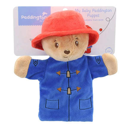 Plush Paddington bear hand puppet with red hat and blue coat on a white background