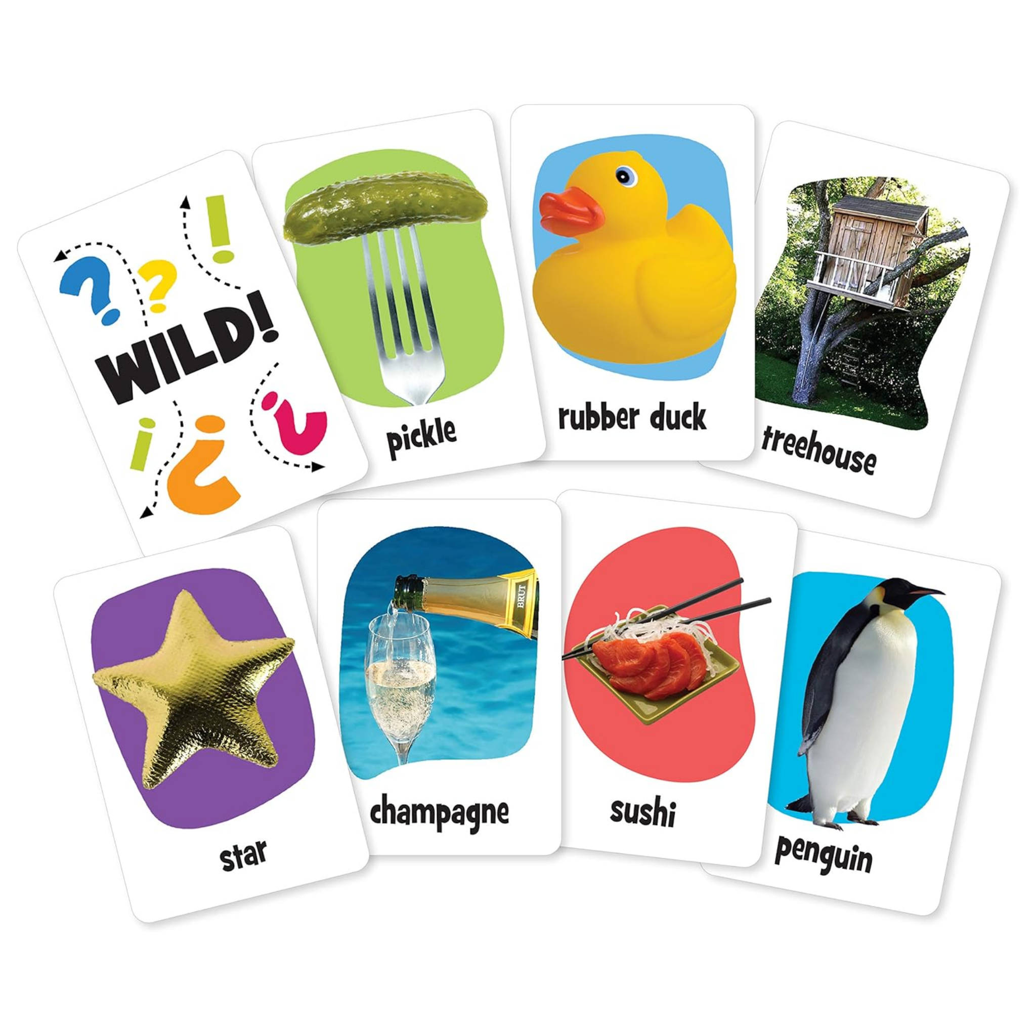 The Pickles To Penguins Travel Game by Outset Cheatwell is a creative card game featuring images like "WILD!", a pickle on a fork, rubber duck, treehouse, starfish, champagne in ice, sushi plate, and penguin. Ideal for sparking creativity through picture-linking fun!.