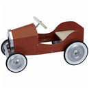 The Vilac Large Pedal Car - Red, by Vilac, is a classic metal pedal car with a timeless design, featuring a red metal body, white steering wheel, and silver wheels. Resembling a vintage roadster, it has an uncomplicated seat and open sides for young drivers to enjoy the ride.