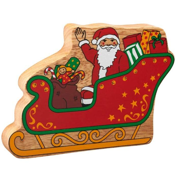 Crafted as a natural wood product, the Wooden Christmas Toy Figures by Lanka Kade depict Santa Claus waving from a red sleigh filled with colorful gifts and a sack. Wearing his traditional red suit and hat, this fair-trade wooden puzzle piece embodies the festive spirit.