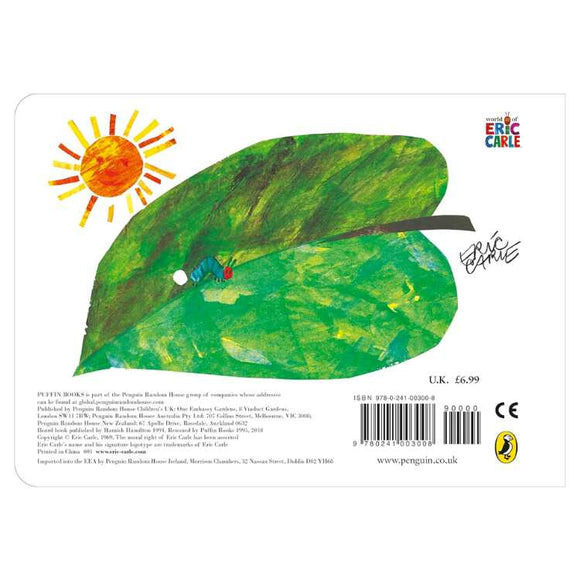 Cover of the cherished "The Very Hungry Caterpillar" Board Book by Puffin, displaying a large green leaf with a small blue and red caterpillar near the edge. A vibrant sun with orange rays adorns the top left corner, while Eric Carle's name is prominently featured in the top right corner.