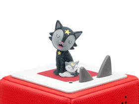 A figurine set featuring a black cat adorned with yellow stars and a smaller gray cat with a moon on its forehead, both looking peaceful. They sit atop the Tonie - Favourite Children's Songs - Bedtime Songs & Lullabies device by Tonies, with two triangular speakers positioned behind them.