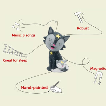 Product Description: The charming Tonie - Favourite Children's Songs - Bedtime Songs & Lullabies from Tonies features a beautifully hand-painted black cat with closed eyes, accompanied by a small sleeping kitten. Surrounding text emphasizes its standout features: soothing bedtime songs, durability, suitability for sleep routines, and magnetic capabilities. Elegant musical notes and stars decorate the figure to enhance its magical nighttime ambiance.