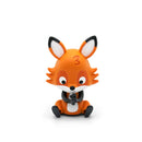 An adorable orange fox figurine with big ears and the number "3" on its head, sitting with its legs crossed and eyes gazing downwards, perfectly encapsulates the playful charm of multilingual counting fun. This whimsical character brings to mind the enchanting Tonies' product, Tonie - Favourite Children's Songs - Counting Songs series.
