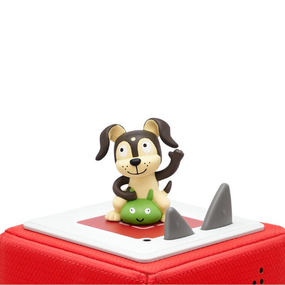 A charming figurine from Tonies, featuring a cartoon dog with long ears perched on a green creature, beautifully encapsulates the lively spirit of playtime and parties. This delightful scene rests upon a red square base embellished with gray triangular patterns and belongs to the "Tonie - Favourite Children's Songs - Playtime & Action Songs" collection.