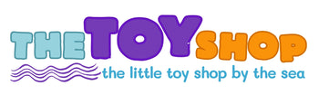 &#39;The Toy Shop&#39; in large bold letters with the wording &#39; the little toy shop by the sea&#39; in turquoise below.