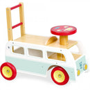 The Vilac 2-in-1 Retro Wooden Camper Van is a charming ride-on toy from Vilac. Shaped like a retro campervan, it features red and yellow wheels, a red steering wheel, and a rear ladder. Painted light blue and white with a playful bear face on the front, it's perfect for fun adventures.