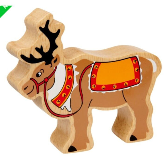 This fair trade toy from Lanka Kade is a delightful wooden reindeer featuring painted details. It comes with a red harness and an orange saddle decorated with yellow stars, making it a captivating addition to any Wooden Christmas Toy Figures collection.
