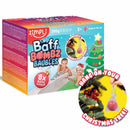 A Zimpli Kids Baff Bombz Baubles package, featuring colorful fizzing bath bombs, shows kids bathing and a decorated Christmas tree. An inset displays a skin-safe bath bomb on a tree branch with the text: "Hang on your Christmas tree!.