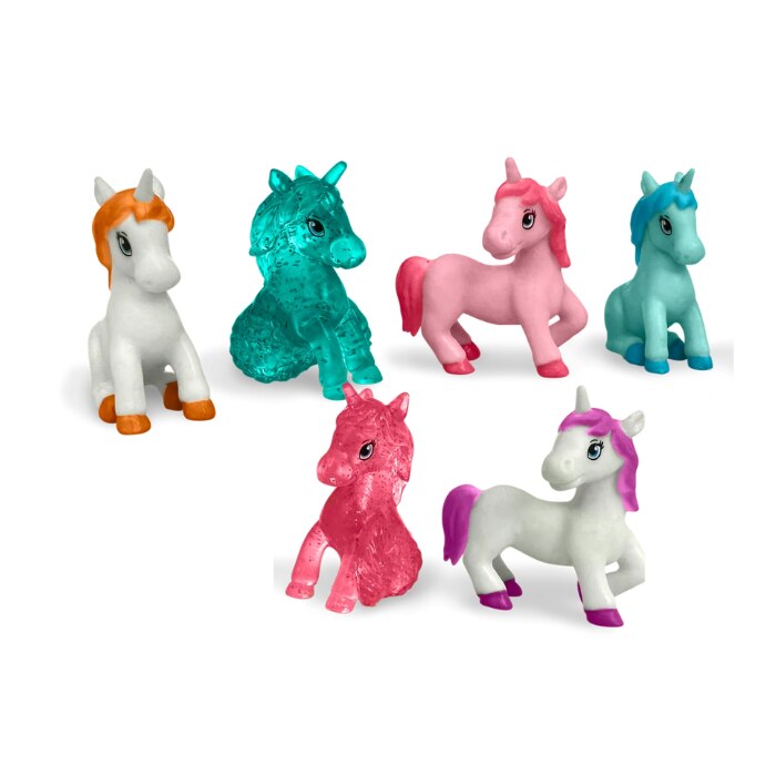 Six vibrant unicorn figures from the Zimpli Unicorn Surprise Figure Baff Bombz collection by Zimpli Kids are showcased. Each one is uniquely styled in colors such as white with orange, teal, pink, blue, and white with purple. They whimsically pose on a biodegradable backdrop. Arranged in two rows of three, these lively characters captivate with their playful expressions.