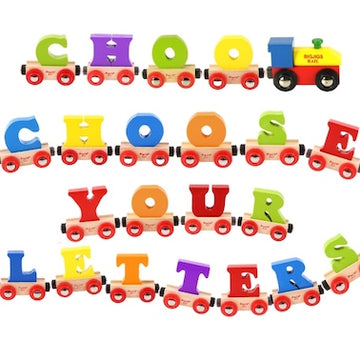 The Personalised Rail Name Letters by BIGJIGS feature a series of vibrant toy train cars that spell out "CHOOSE YOUR LETTERS," providing a charming opportunity to customize your train set. Every car displays a distinctively colored letter, while the set is led by a small engine with a yellow roof, ensuring it becomes an enduring gift from one of the renowned wooden railway brands.