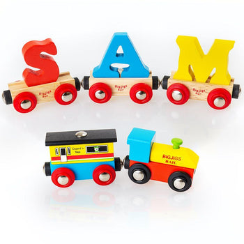 This personalized rail name letter set, featuring wooden train cars spelling "SAM" in vibrant red, blue, and yellow letters, is beautifully complemented by a colorful guard's van and a blue engine adorned with the "BIGJIGS" logo. Crafted by the esteemed BIGJIGS brand, this train set makes a memorable gift against a white backdrop.