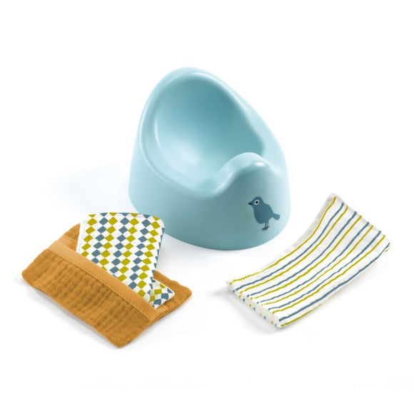 The Djeco Doll Potty & Wipes set includes a light blue potty with a bird illustration, FSC-certified diamond-pattern cloth in a brown holder, and striped cloth with blue, yellow, and white lines—perfect for enhancing your baby doll furniture collection.