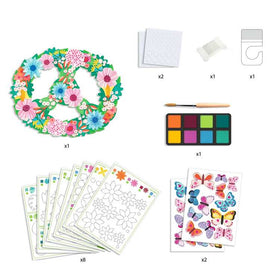 Introducing the DIY Flower & Butterfly Mobile by Djeco, a creative kit featuring a peace sign wreath adorned with colorful flowers. The set comes complete with a paint palette, brush, adhesive dots, suction hook, and butterfly stickers. Additionally, it includes eight sheets of floral outlines and gouache paints for endless artistic expression.