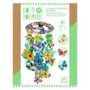 Discover the "DIY Flower & Butterfly Mobile" by Djeco, a creative kit designed for crafting an exquisite floral mobile featuring colorful butterflies, flowers, and leaves. Packaged in green and white with "Do It Yourself" text across it, this kit is ideal for ages 7 and up. Let your imagination take flight as you use the included gouache paints to bring your unique masterpiece to life.