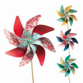 Introduce your space to a touch of whimsy with Djeco's DIY Windmills. This set includes four colorful decorative windmills featuring floral patterns on wooden sticks. One windmill stands out with its predominantly red design, while the others showcase varying shades of green, yellow, and blue complemented by intricate designs. Crafted from FSC-certified paper, these beautiful windmills spin gracefully against a white background.