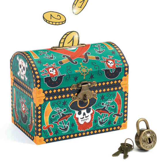 The Pirate Money Box by Djeco is a vibrant treasure chest with a pirate theme, adorned with skulls and anchors. Gold coins can be inserted through the slot on top. Accompanied by an antique-style padlock and two keys, this charming piggy bank is perfect for safeguarding your treasures like a true pirate.