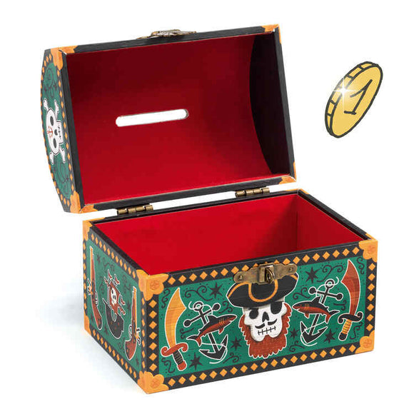 A vibrant Pirate Money Box from Djeco features a pirate-themed treasure chest with an open lid, decorated with skulls and swords along its sides. This wooden piggy bank boasts a red interior and a convenient slot on top for collecting savings. Adjacent to it, a gold coin seems to hover, enticing adventurers to contribute to their collection in this pirate money bank.