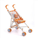 The Djeco Stroller Forest features a toy doll in a striped outfit with a gray hood, seated in a colorful, foldable stroller with orange and white accents. It includes patterned fabric, four orange wheels, and curved handles, all set against a plain white background.