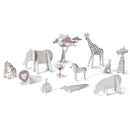 Discover Djeco's Colour, Assemble & Play - Savannah kit, showcasing a delightful set of cardboard savannah animals such as an elephant, giraffe, and lion. Adorned with purple and grey details and arranged in a row, these figures offer a fun experience in coloring and assembly while showcasing various poses and sizes.