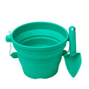 A teal Scrunch Mini Bucket & Spade with a rope handle, ideal for young gardeners, features the SCRUNCH brand.
