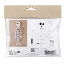 Introducing the Mini Craft Kit Paper Decorations, Skeleton from Creativ Company—a perfect Halloween craft kit for children. This delightful set features a paper skeleton with wavy arms and legs, includes guides for cutting out a skull and hands, and comes with a small glue stick. The packaging provides detailed assembly instructions and lists all components, featuring a barcode at the bottom for easy reference.