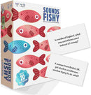 The packaging of "Sounds Fishy" by Big Potato, a lively trivia game, features bright and colorful fish illustrations. Two of the cards include the quirky questions: "In medieval England, what was sometimes used instead of money?" and "A woman from Bristol, UK, got stuck in a bathroom window trying to do what?