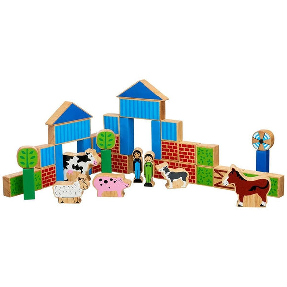 Wooden farm toy set with animals and buildings on a white background