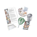 Contents of seashore kit including fishing net and notebook.