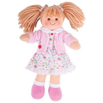 Soft, cuddly rag-doll toy wearing a floral dress and wink cardigan.