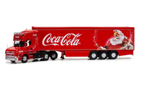 Side view of the model Coca Cola Christmas truck.