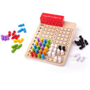 Wooden board game with colourful pegs and black and white pegs.