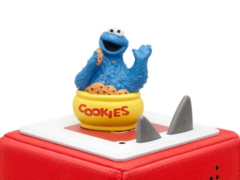 Cookie Monster figure atop a red Toniebox.