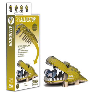 Alligator cardboard craft figure standing beside its box.