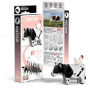Pack containing cardboard Eugy model of a cow.