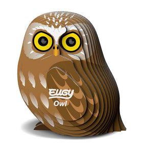 Brown Eugy owl with yellow beak.