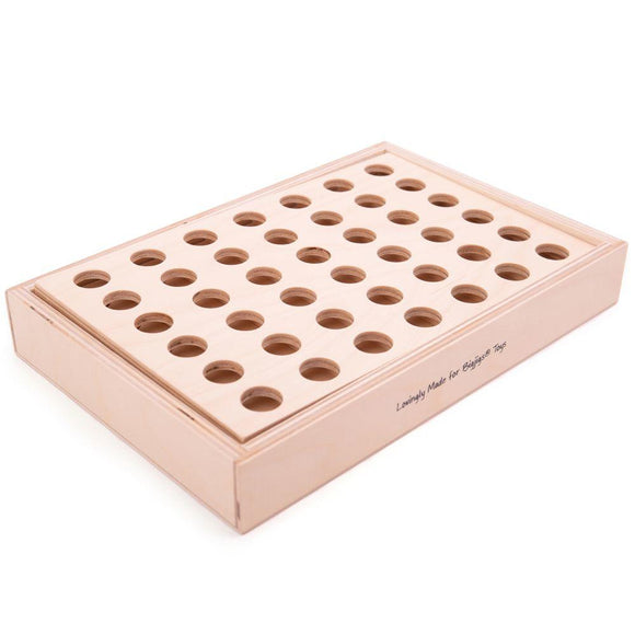 Wooden four-in-a-row game folded away.