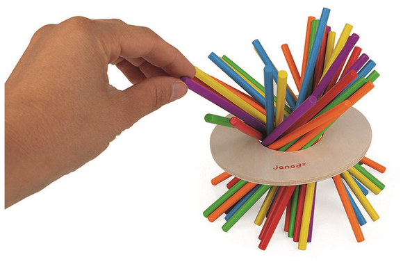 Hand picking colourful sticks.