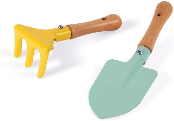 Small yellow rake and green trowel that come in the wheelbarrow box.