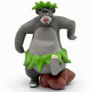 Baloo bear figure from The Jungle Book wearing a green hula skirt.