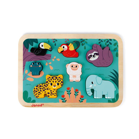 The Chunky Jungle Wooden Puzzle by JANOD features six pieces shaped like jungle animals: a toucan, a parrot, a sloth, a leopard, a white monkey, and an elephant. Crafted from FSC-certified wood, the background depicts a vibrant jungle scene with trees and plants.