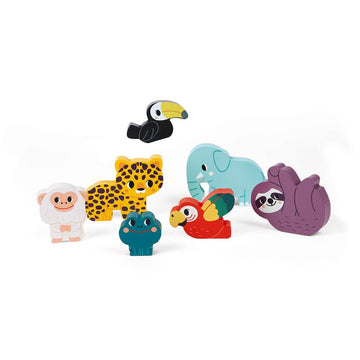 The Chunky Jungle Wooden Puzzle by JANOD features a delightful array of colorful, cartoon-like wooden animal figures crafted from FSC-certified wood. The set includes a gorilla, leopard, toucan, elephant, sloth, frog, and parrot. The pieces are arranged against a white background with the toucan appearing to be suspended in mid-air above the other animals.