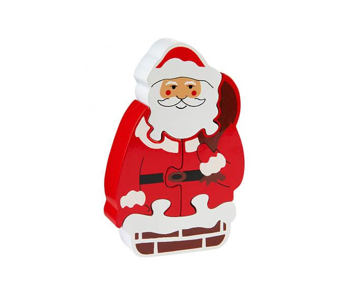 Santa Claus jigsaw puzzle for small children,. Wooden parts in red and white.