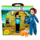 Hayden Lottie Doll standing with toy dog beside manufacturer's packaging.