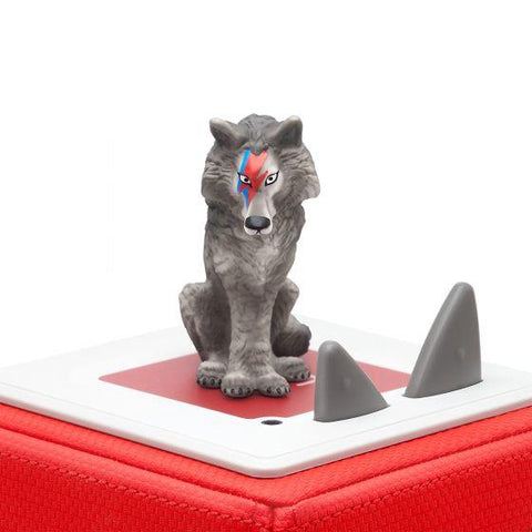 Sitting Wolf figure from Peter and the Wolf sitting atop the red Toniebox.