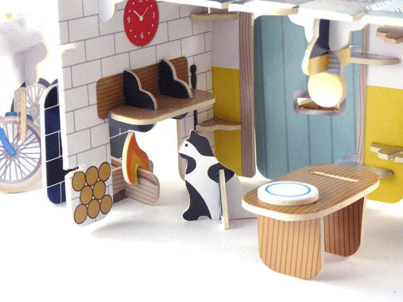 Detail of cat in the kitchen of the Play Press Eco-house.