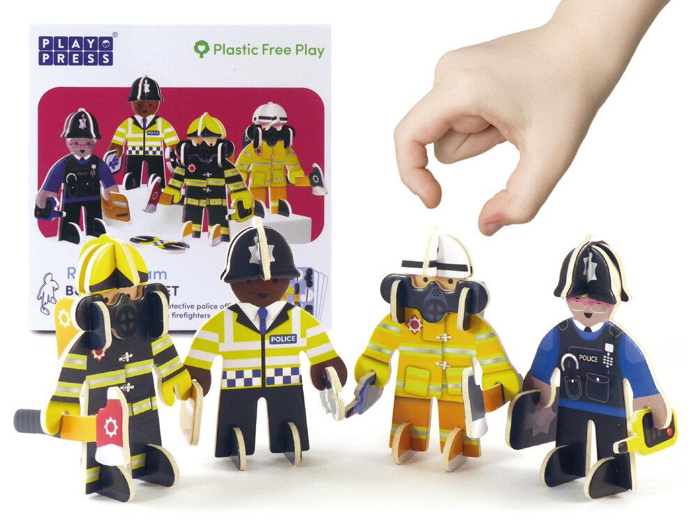 Two cardboard police figures and two firemen play pieces.