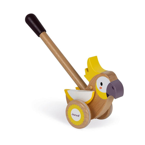 Wooden cockatoo on wheel with push-along pole.